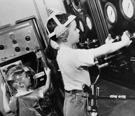 Children Operating a Flight Simulator