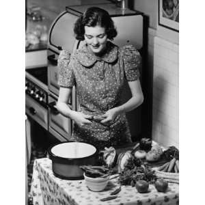108021872_amazoncom-young-woman-preparing-vegetables-in-kitchen-
