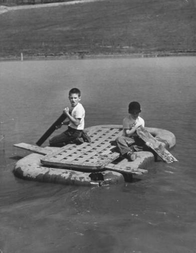 two-boys-playing-on-a-raft