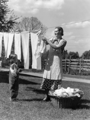 h-armstrong-roberts-mother-and-daughter-doing-laundry-hanging-wash