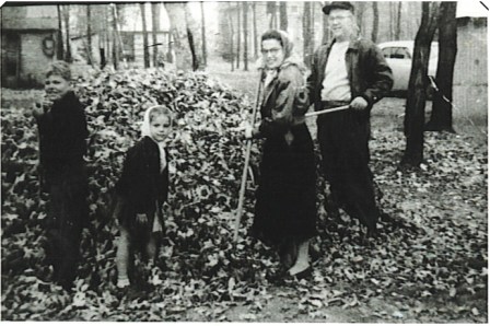 the-cook-fam-raking-leaves