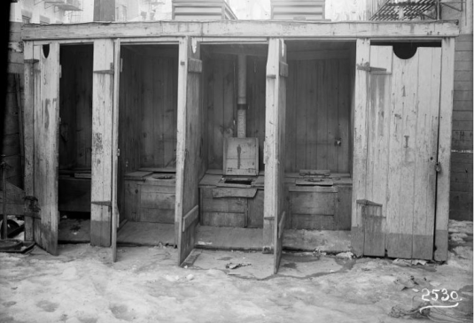 row-of-outhouses-_