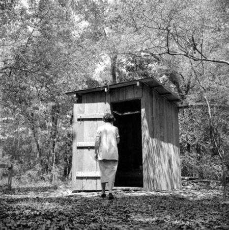 florida-memory-woman-going-into-the-outhouse-in-the-7