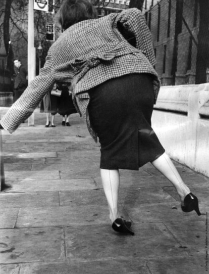 woman falling off heels